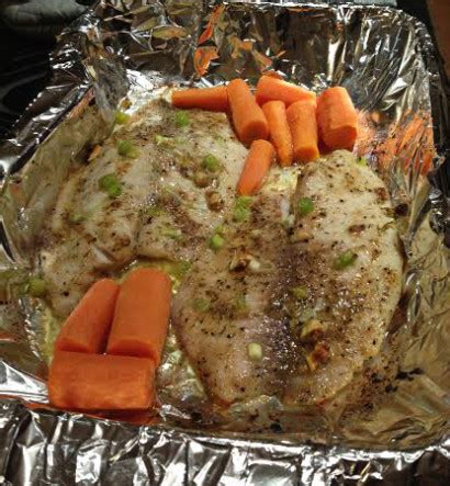 baked-tilapia-with-garlic-butter-tasty-kitchen image