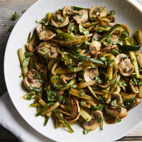 zucchini-mushroom-saut-recipe-eatingwell image