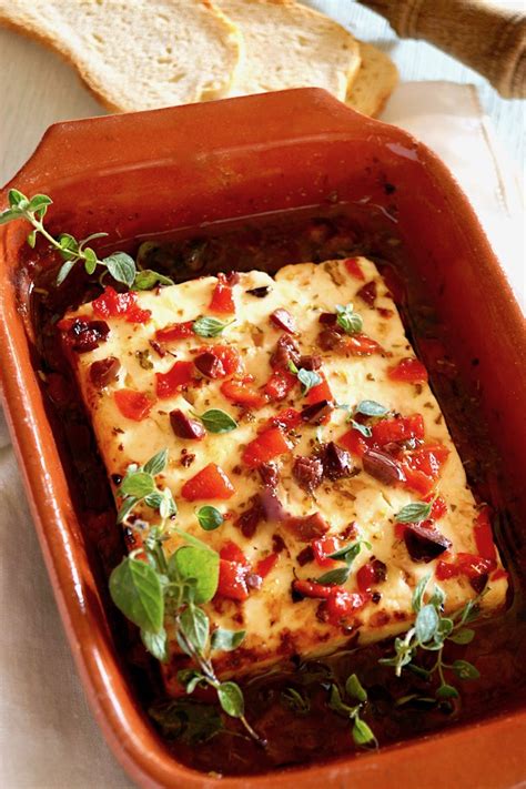 baked-feta-appetizer-with-olives-cooking-on-the image