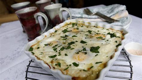 creamed-leeks-and-spinach-with-eggs-on-top-the image