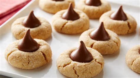 how-to-make-classic-peanut-butter-blossom-cookies-video image