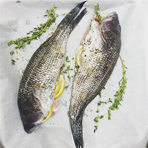 whole-roasted-black-sea-bass-with-lemon-and-herbs image