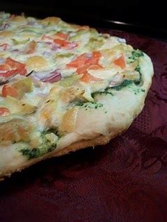 pesto-chicken-and-artichoke-pizza-tasty-kitchen-a image
