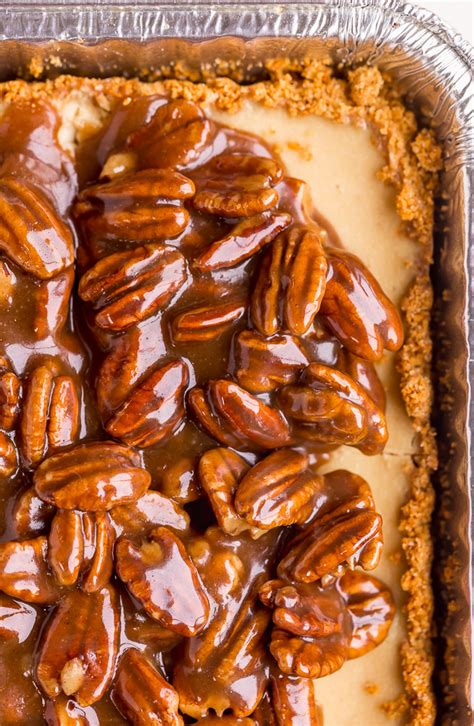 easy-pecan-pie-cheesecake-bars-baker-by-nature image