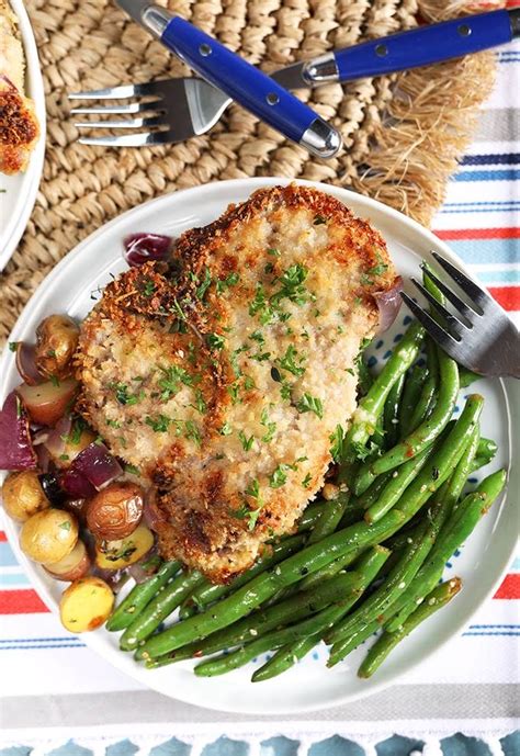 baked-pork-chops-with-onions-and-potatoes image