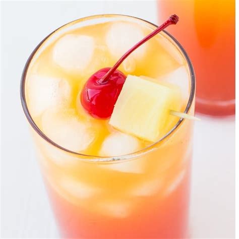 easy-pineapple-rum-punch-deliciously-sprinkled image