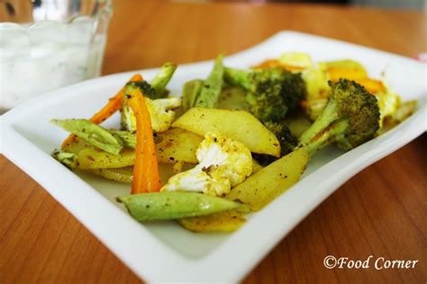 roasted-vegetables-with-garlic-and-cilantro-yogurt-dip image