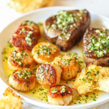 garlic-butter-steak-scallop-recipe-damn-delicious image