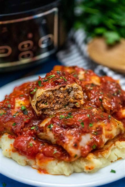 slow-cooker-stuffed-cabbage-rolls-sweet-and-savory image