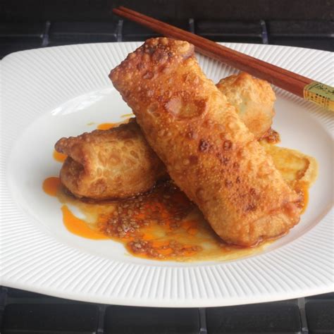 crawfish-egg-rolls-with-hot-sesame-drizzle-emerilscom image