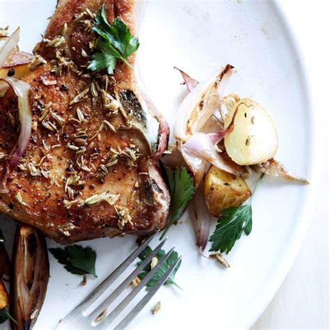fennel-crusted-pork-chops-with-potatoes-and-shallots image