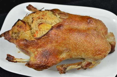 roasted-stuffed-duck-recipe-momsdish image