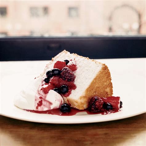 angel-food-cake-with-three-berry-compote-recipe-food-wine image
