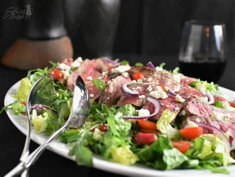 steak-salad-with-blue-cheese-crumbles-the-spicy image