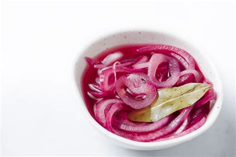 easy-pickled-red-onions-the-spruce-eats image