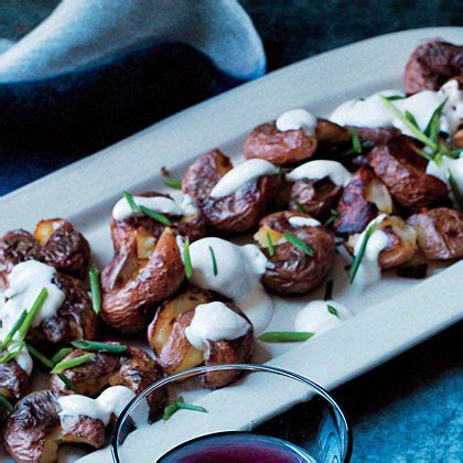 crispy-smashed-potatoes-with-chive-sour-cream image
