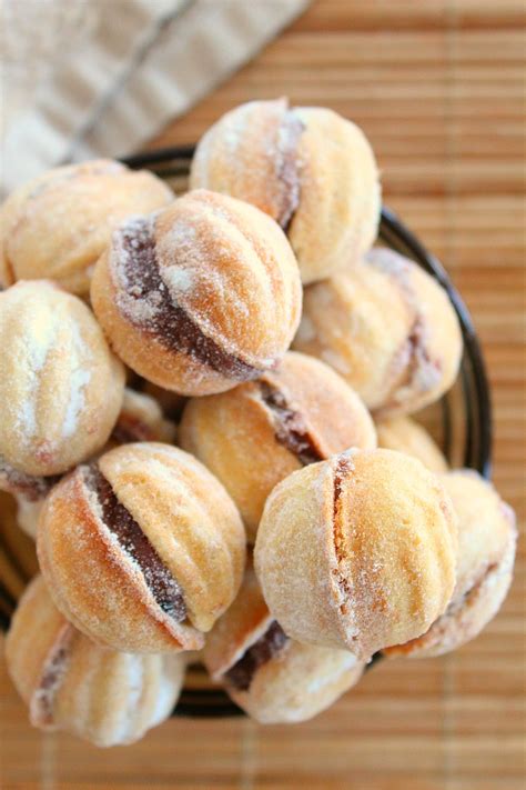 walnut-shaped-cookies-filled-with-walnut-cream-easy image