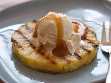 grilled-pineapple-with-vanilla-ice-cream-and-rum-sauce image