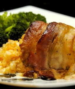bacon-wrapped-stuffed-chicken-thighs-recipe-stl image