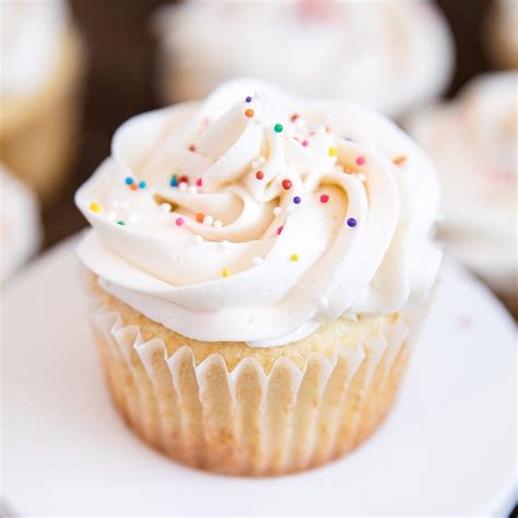 easy-vanilla-cupcakes-with-vanilla-buttercream-yellow image