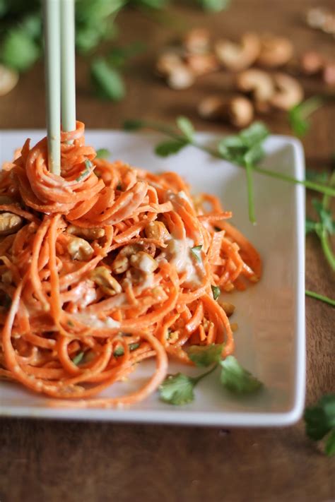 raw-carrot-pasta-with-ginger-lime-peanut-sauce-the-roasted image