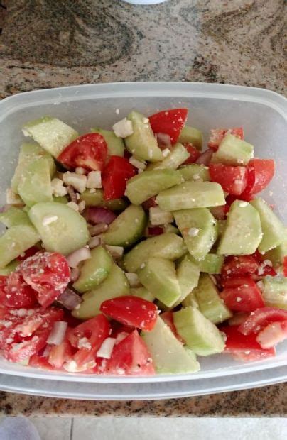 greek-style-cucumber-tomato-onion-salad image