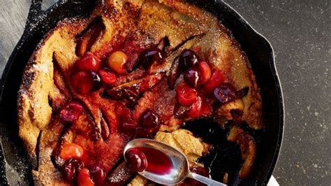 peach-dutch-baby-pancake-with-cherry-compote image
