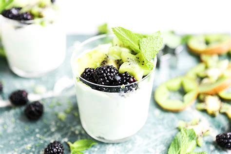 kiwi-and-lime-curd-fools-with-blackberries-floating image