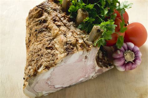 classic-roast-rack-of-pork-recipe-the-spruce-eats image