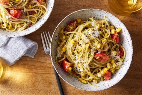 basil-pesto-spaghettini-with-corn-tomatoes-blue image
