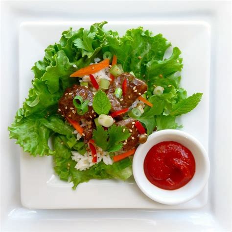 beer-and-sriracha-marinated-beef-lettuce-cups-wbur image
