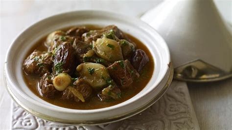 lamb-shallot-and-date-tagine-recipe-bbc-food image