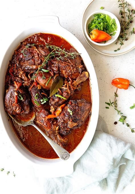 the-best-authentic-jamaican-brown-stew-chicken image