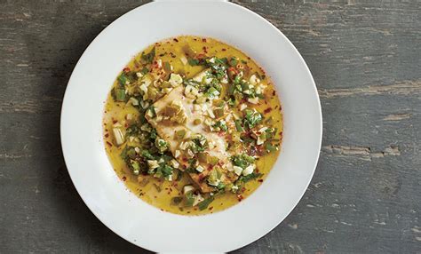 fish-in-olive-oil-lemon-and-cilantro-sauce image