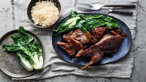 spiced-honey-roasted-duck-with-rice-and-asian-greens image