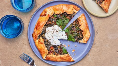 olive-oil-galette-with-spicy-greens-recipe-bon-apptit image