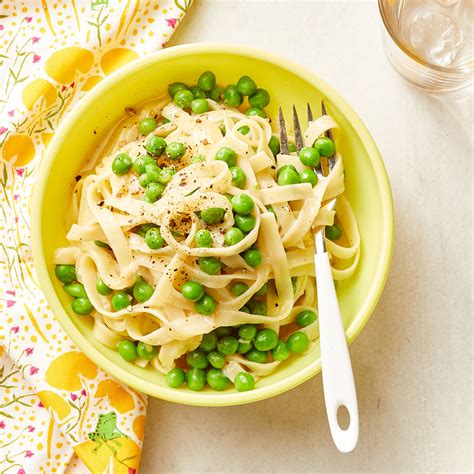 cacio-e-pepe-pasta-with-peas-eatingwell image