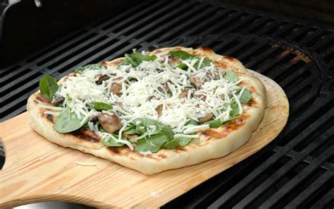 grilled-pizza-with-spinach-mushrooms-and-garlic image