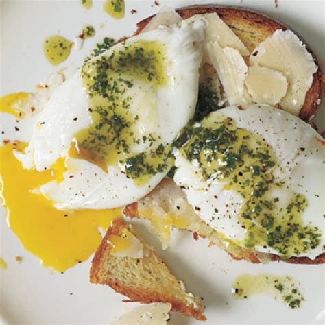 poached-eggs-and-parmesan-cheese-over-toasted image