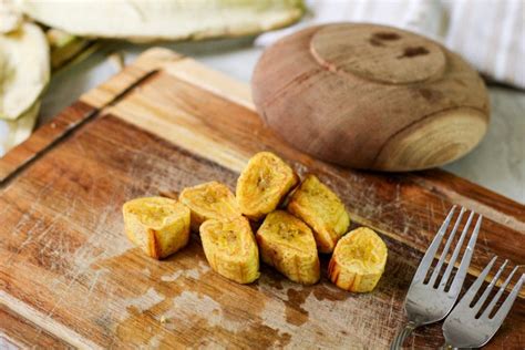 crispy-garlic-tostones-twice-fried-plantains-latina image