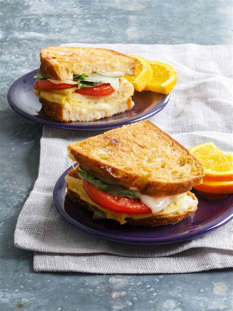 cheesy-egg-sandwiches-better-homes-gardens image