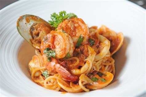 pan-seared-scallops-with-pasta-recipe-camerons-seafood image