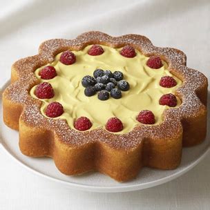 daisy-ann-cake-with-lemon-curd-and-berries-food image