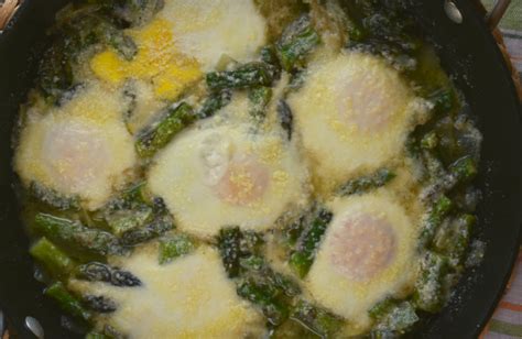 baked-eggs-and-asparagus-recipe-with-parmesan image