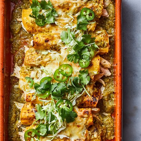 chicken-tomatillo-enchiladas-recipe-eatingwell image