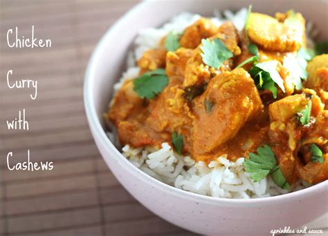 chicken-curry-with-cashews-sprinkles-and-sauce image