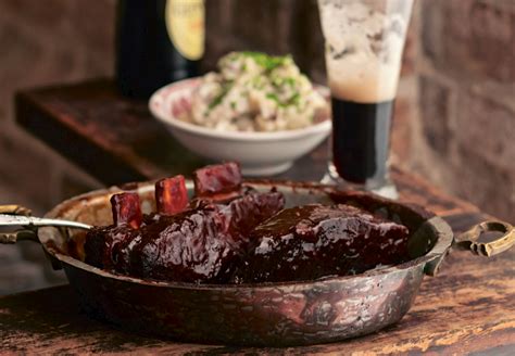 braised-beef-short-ribs-with-guinness-recipe-food-republic image