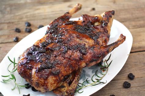 balsamic-cherry-glazed-roasted-duck-with-stuffing image