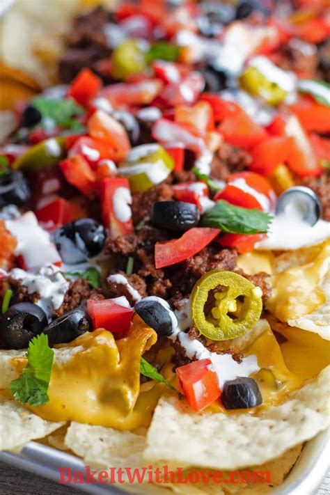 the-best-nachos-supreme-loaded-sheet-pan-nachos image