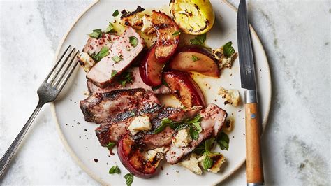 grilled-pork-chops-with-plums-halloumi-and-lemon image